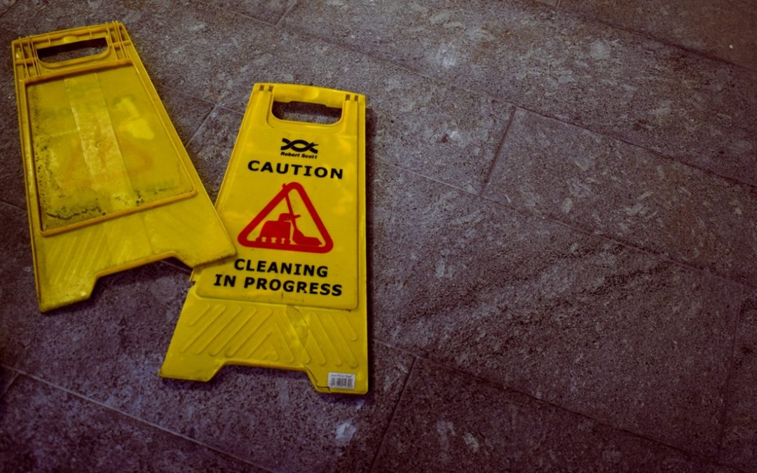 Photo is of signs saying cleaning in progress. This is an emotional connection to a blog on cleaning up business clutter to make room for creativity