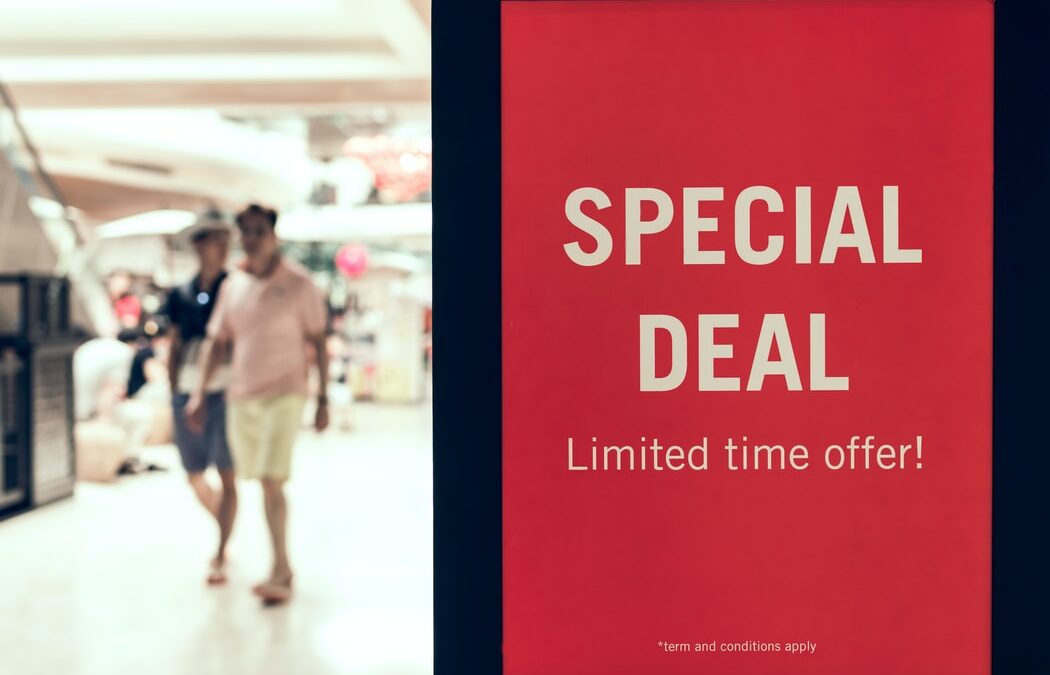 You can upsell your customers with a special deal as shown by the red special deal sign at a shopping mall