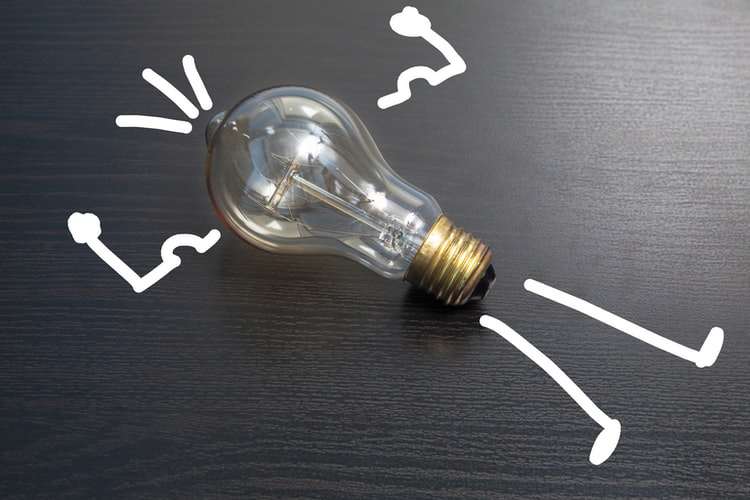 could there be anything more indicative of freelance ideas than a lightbulb on a dark surface with strong man arms and legs drawn around it?