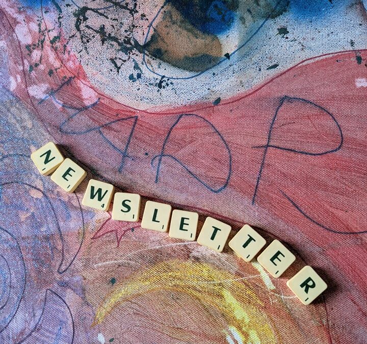 On a painting, scrabble letters spell out newsletter for freelance newsletter the Freelance Jungle